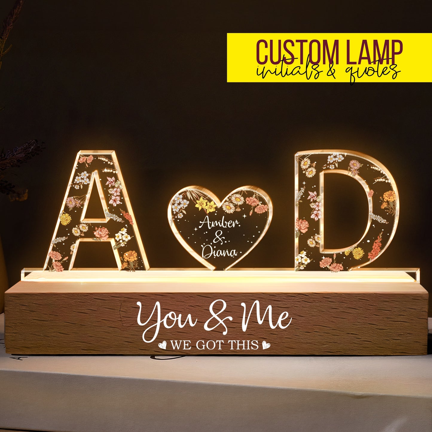 Engraved couple names light with floral details and heartfelt message on wooden base.