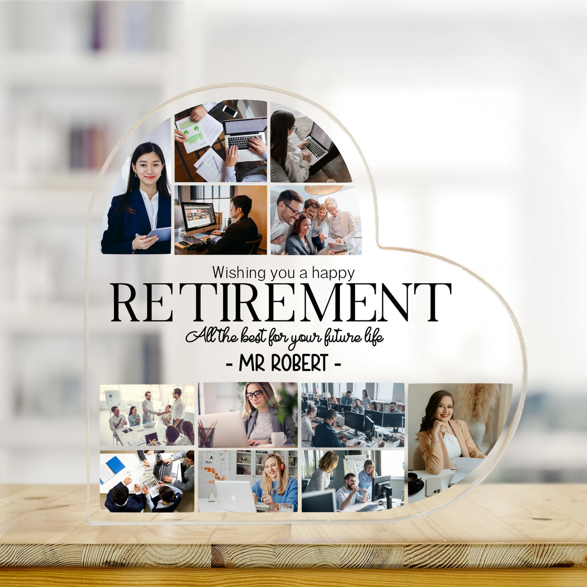 Heart-shaped collage with photos of people working, wishing a happy retirement on a wooden surface.