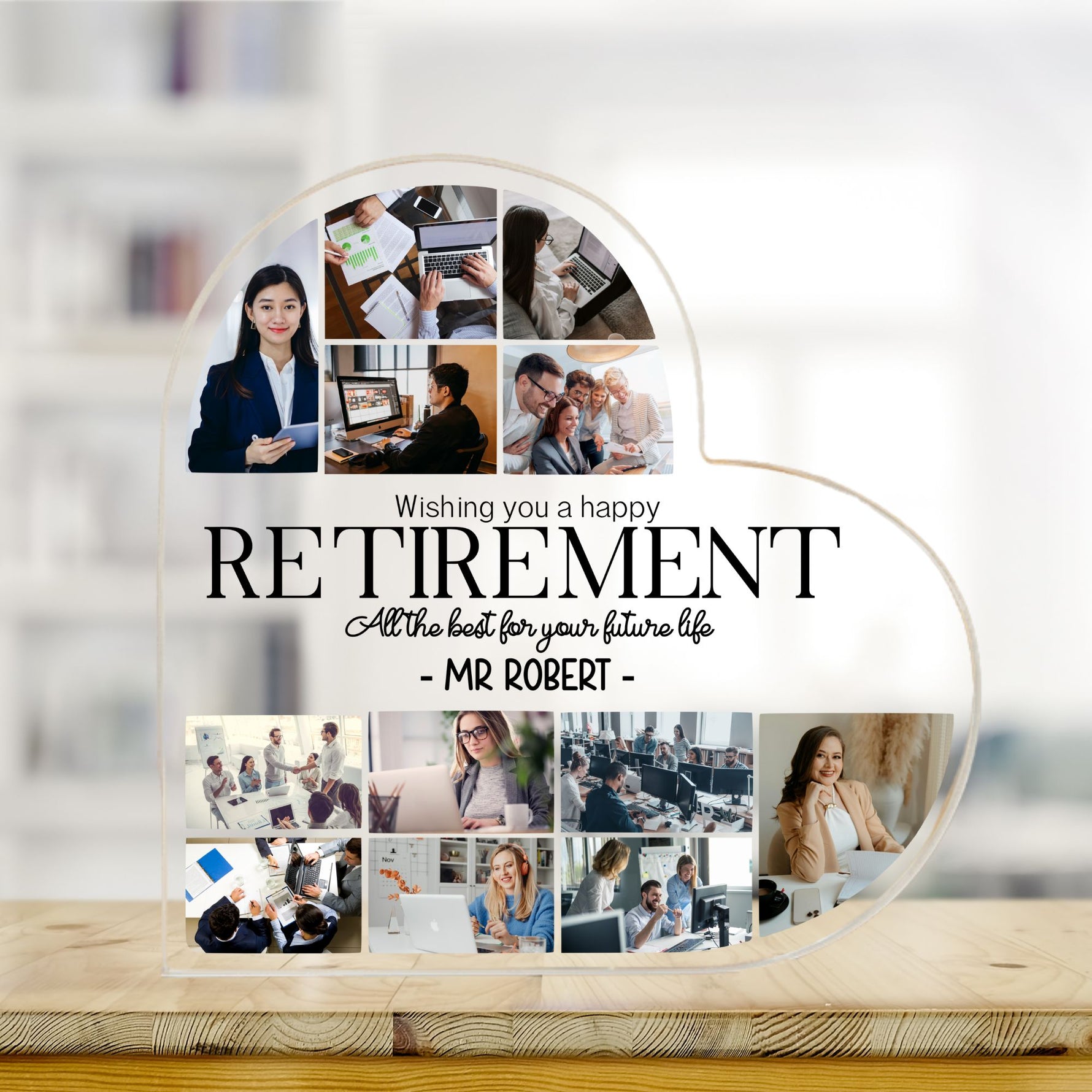 Heart-shaped collage with photos of people working, wishing a happy retirement on a wooden surface.