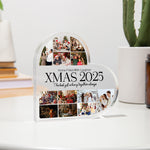 Heart-shaped photo collage display with 'XMAS 2025' text on a white surface.