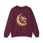 Floral sweatshirt worn by a model, front view