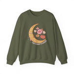 Floral sweatshirt worn by a model, side view