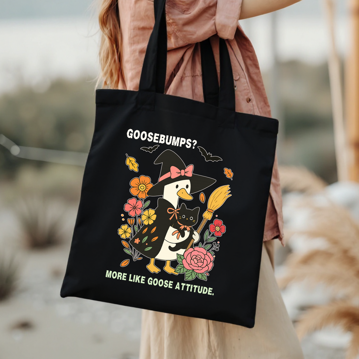 Funny Halloween Witch Goose tote bag carried by hand