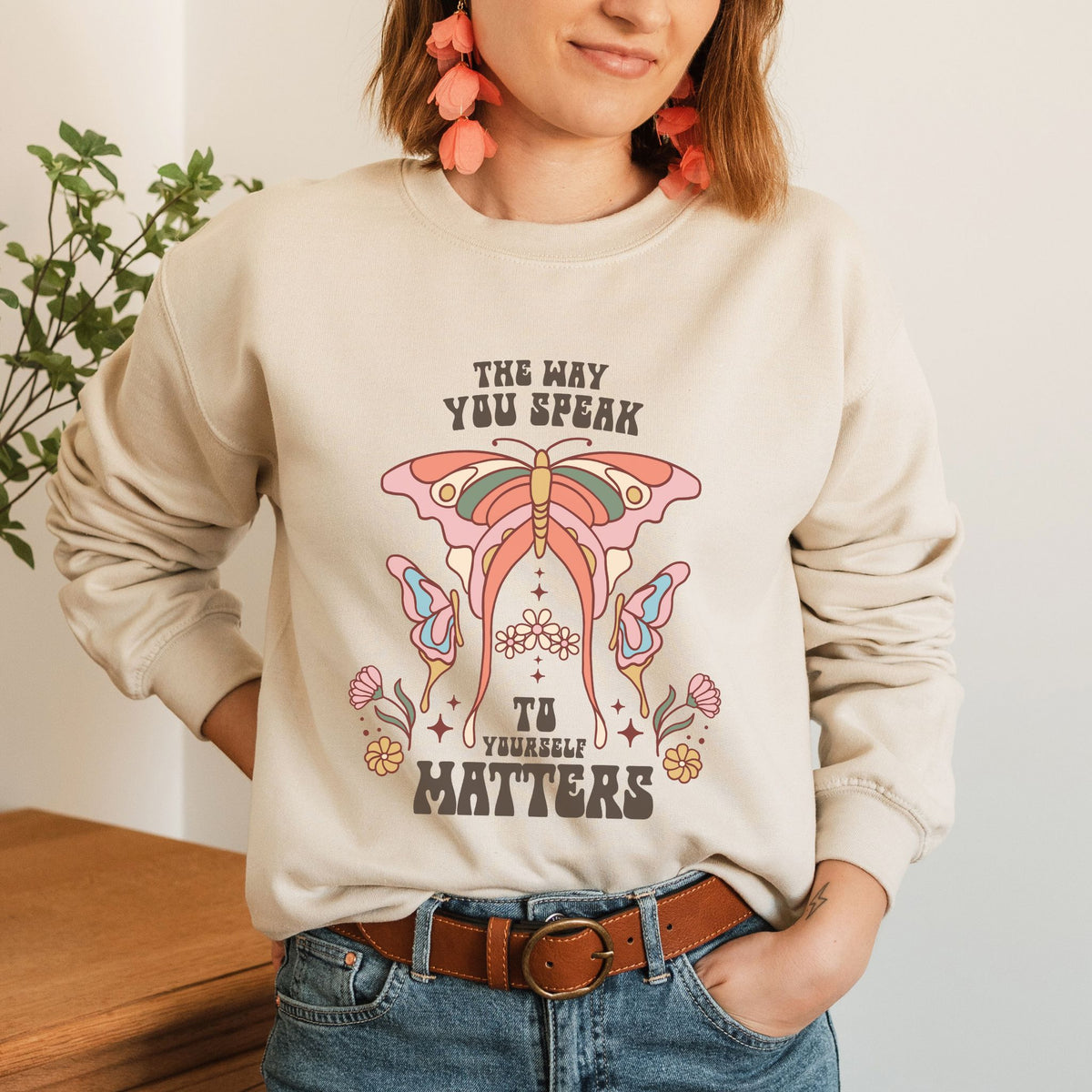 Self Love sweatshirt from a side angle