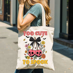 Too Cute To Spook tote bag shown in a lifestyle setting